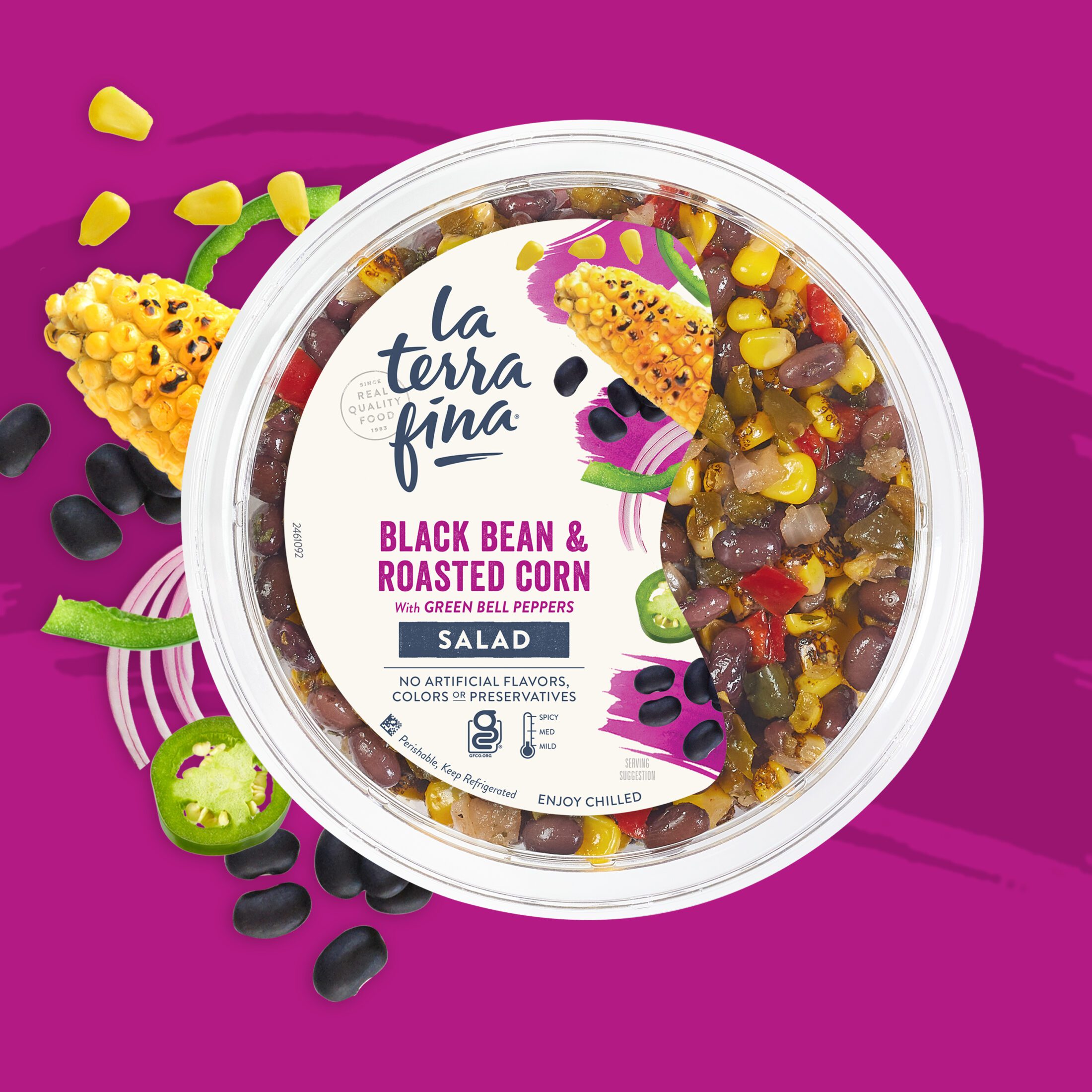 La Terra Fina Black Bean & Roasted Corn Salad top lid with scattered ingredients off to the side, over a magenta colored background with a vector paint stroke.