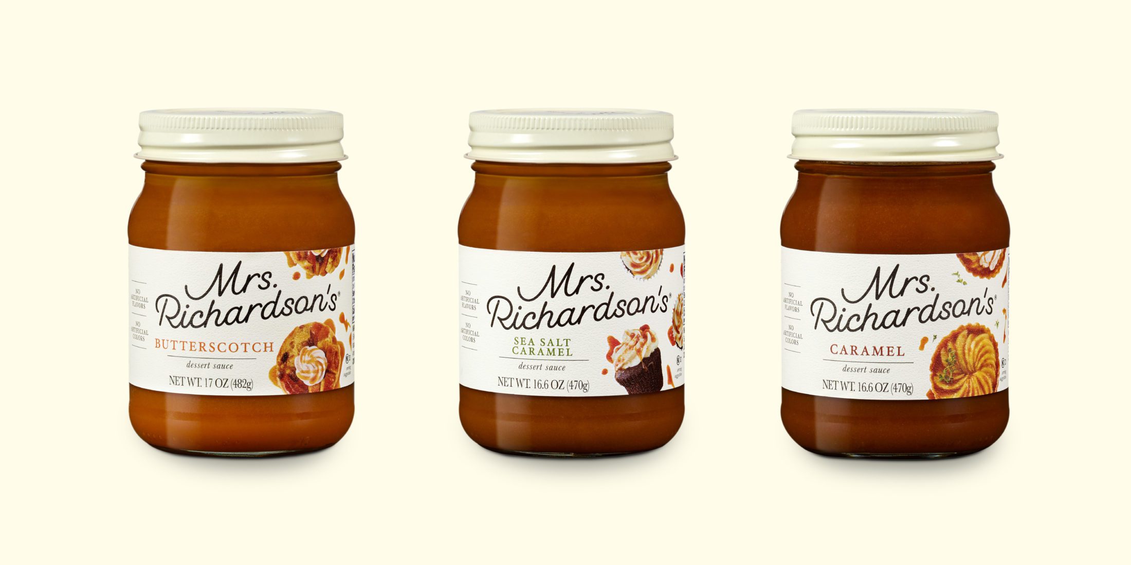 Three jars of Mrs. Richardson's Dessert Sauces lined up on a cream-colored background. Flavors from left to right, Butterscotch, Sea Salt Caramel, and Caramel.