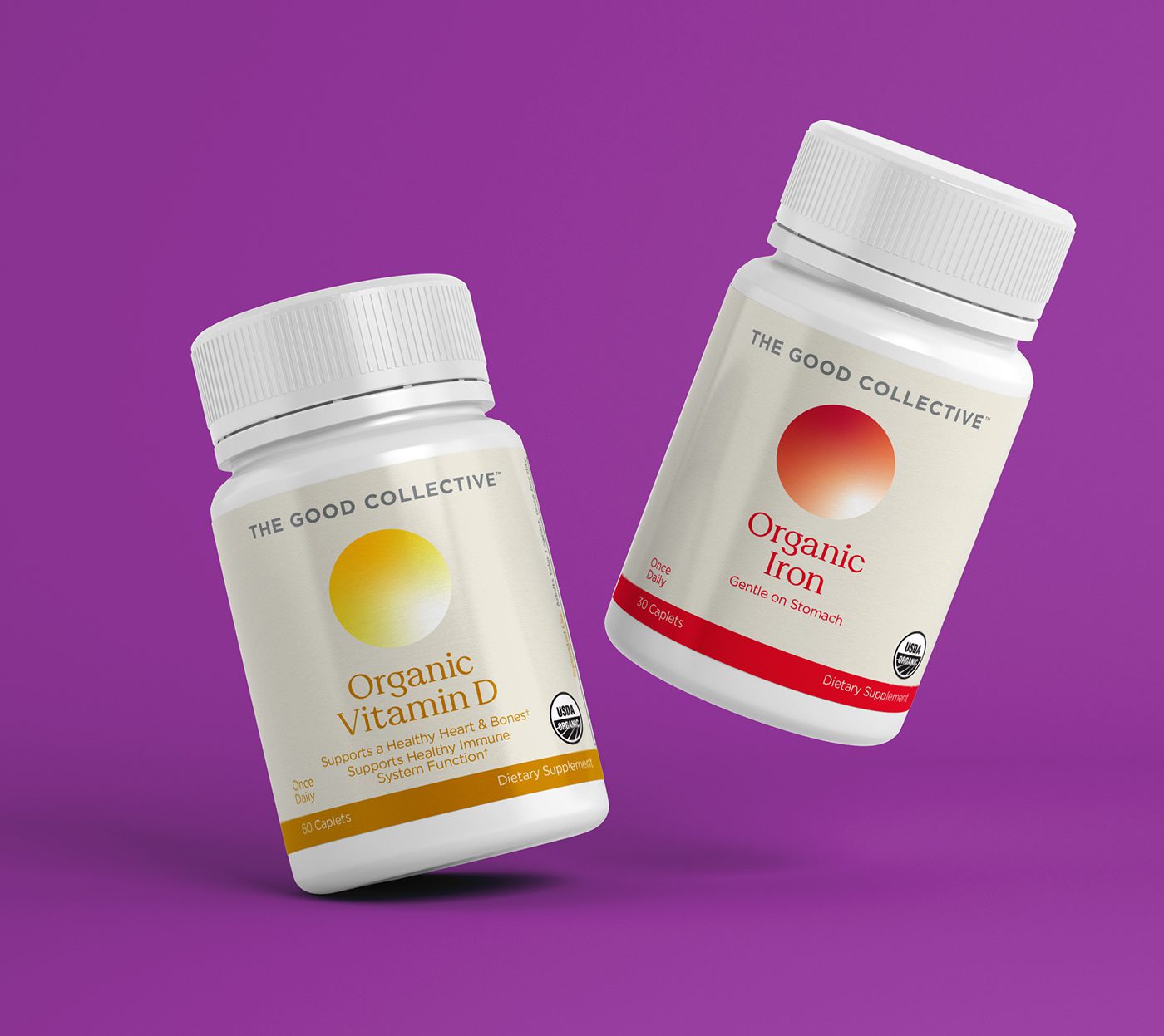 Two floating angled bottles of The Good Collective vitamins, Organic Vitamin D and Organic Iron.
